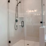 Square,Bathroom,Shower,Stall,With,Half,Glass,Enclosure,Adjacent,To