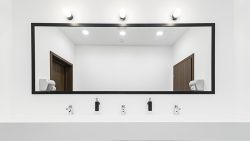 Modern,Toilet,With,A,Large,Illuminated,Mirror.,Wide,Sink,With